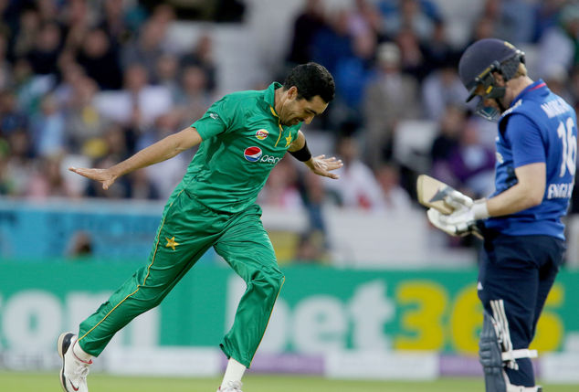 Pakistan's Umar Gul celebrates after taking the wicket of England's Eoin Morgan during the fourth one day international cricket match between England and Pak