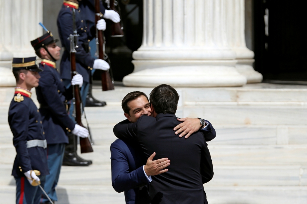 Alexis Tsipras gives a warm welcome to his Italian counterpart Matteo Renzi at Zappeion Hall in Athens Alkis Konstantinidis  Reuters