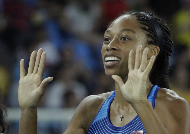 United States Allyson Felix smiles after winning the gold in the women's 4x100-meter final during the athletics competitions of the 2016 Summer Olympics