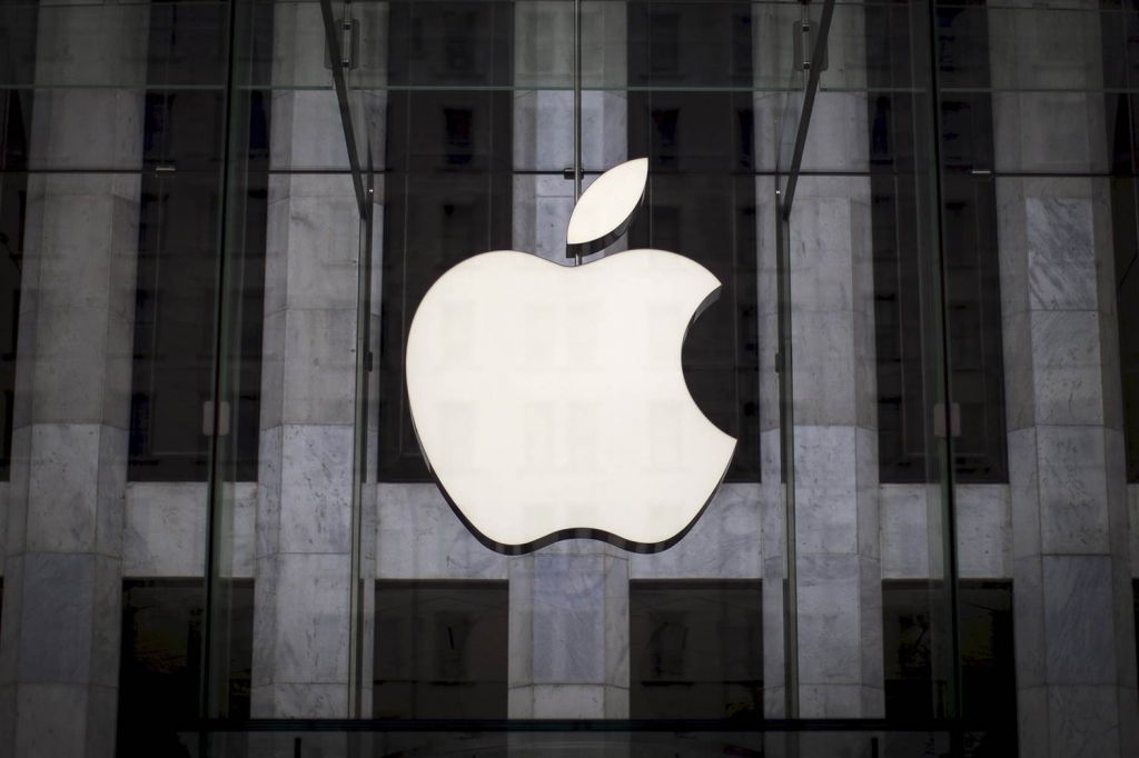 An Apple logo hangs above the entrance to the Apple store on 5th Avenue in New York in 2015. Mike Segar  Reuters file