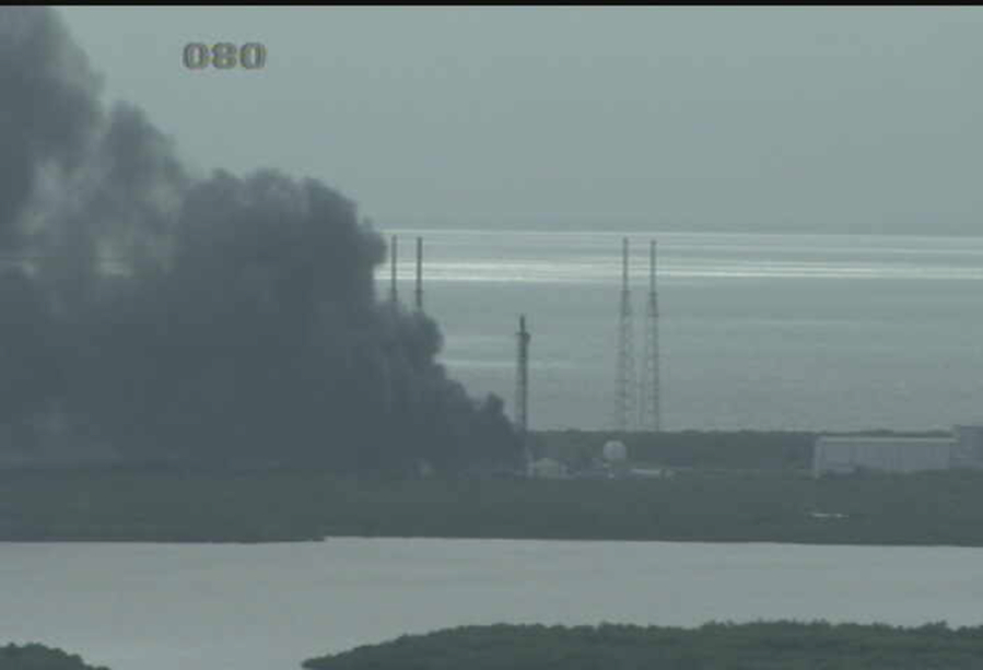 An image from a webcam at NASA'S Kennedy Space Center shows an explosion Thursday at a SpaceX launch site