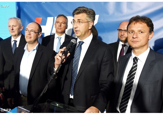 Andrej Plenkovic, leader of the Croatian Democratic Union party, delivers a speech after the party's parliamentary election victory- AFP