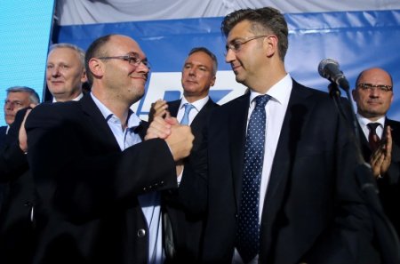 Andrej Plenkovic president of the Croatian Democratic Union , reacts during a speech after exit polls in Zagreb Croatia