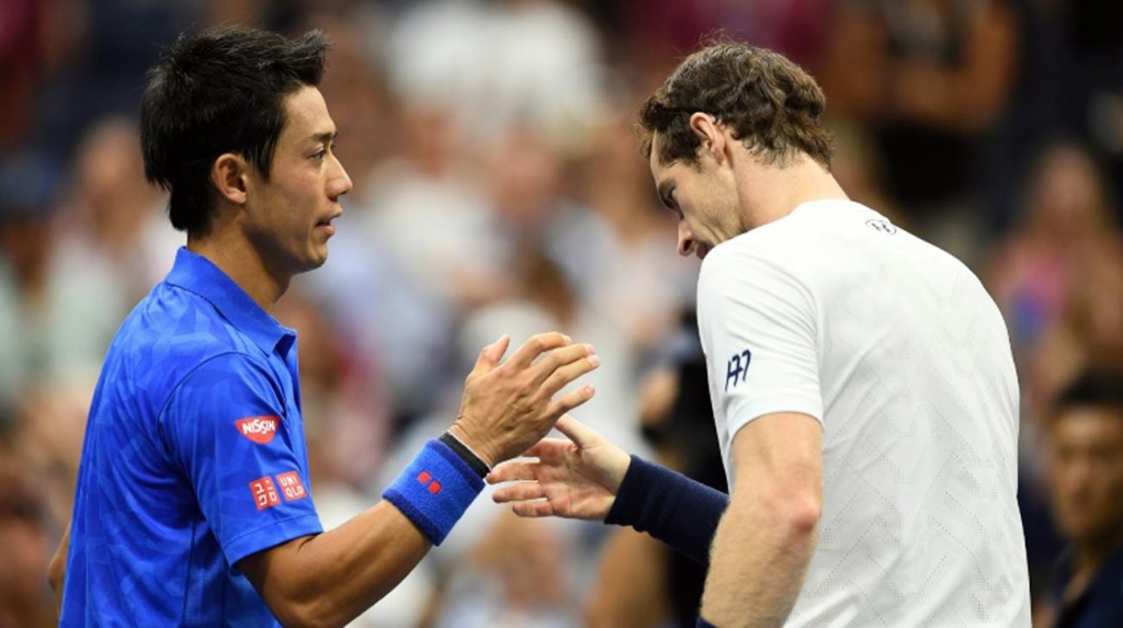 Andy Murray of Britain congratulates Kei Nishikori of Japan at the end of their US Open quarterfinal match on Wednesday