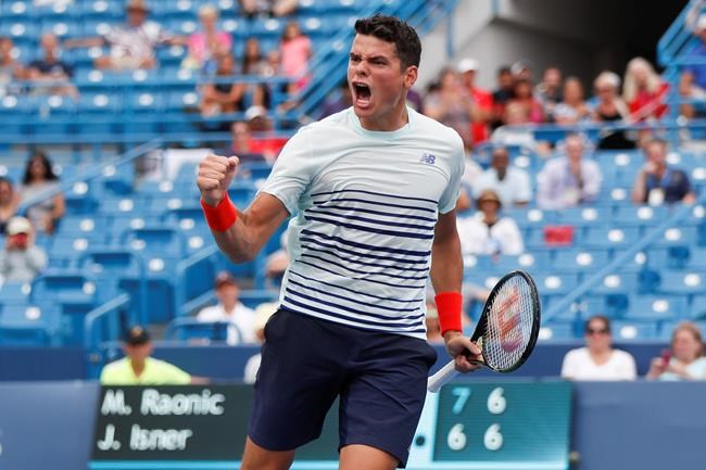 Milos Raonic of Canada reacts after defeating John Isner of the United States on the fifth day of the Western & Southern Open tennis tournament Wednesday Aug. 17 2016 in Mason Ohio