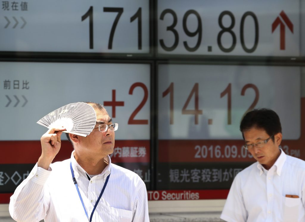 Anelectronic stock board of a securities firm in Tokyo on Monday