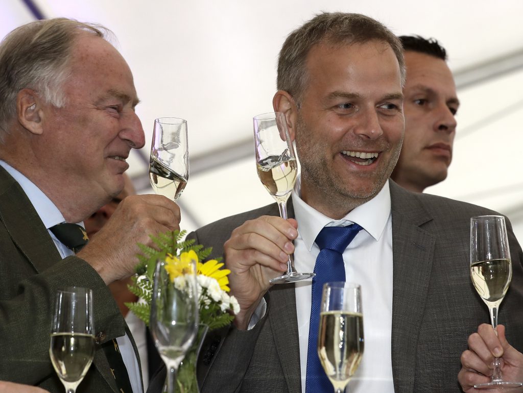 AfD member Alexander Gauland and Leif Erik Holm top candidate of the AfD toast at the gathering of the AfD party in Schwerin Germany on Sunday after the state elections in the German federal state of Mecklenburg-Western