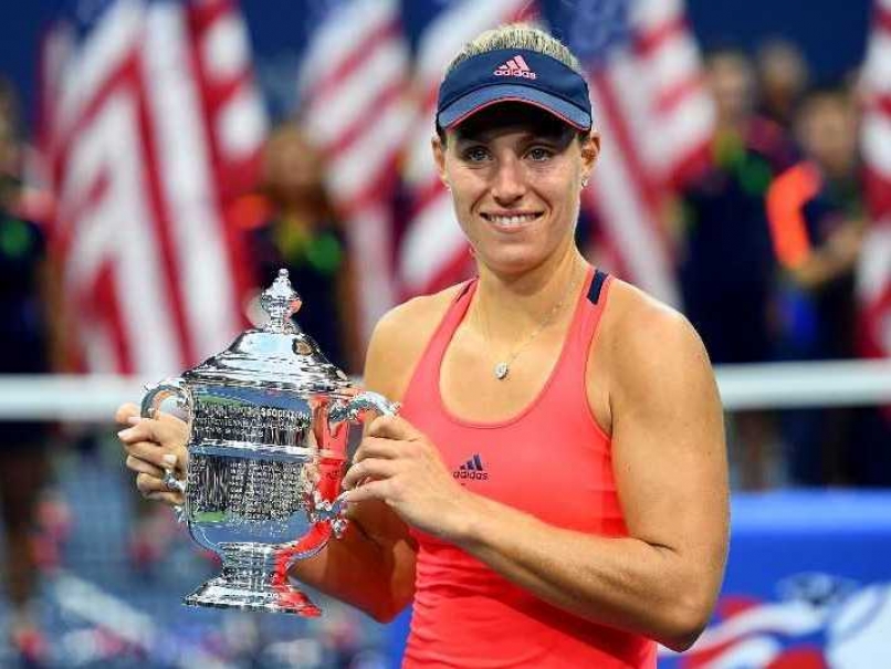 Angelique Kerber of Germany celebrates with the US Open trophy