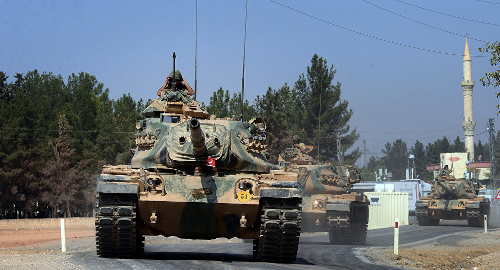 Turkish tanks head to the Syrian border in Karkamis Turkey Wednesday Aug. 31 2016