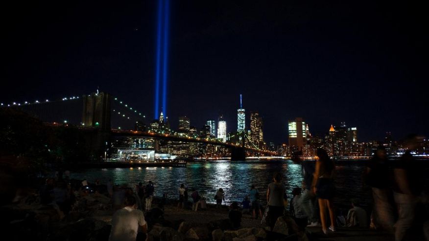 The Tribute in Light viewed from the Brooklyn borough of New York rises above the lower Manhattan skyline Sunday Sept. 11 2016 in New York the fifteenth anniversary of the terrorist attacks of Sept. 11 2001 on the United States. (AP