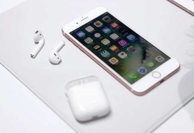 The Apple iPhone7 and Air Pods are displayed during an Apple media event in San Francisco California