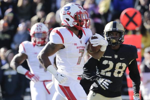 Army's Brandon Jackson pursues Rutgers running back Robert Martin who scored a touchdown during the first half of an NCAA college football game in West Point N.Y. (AP