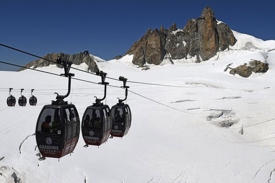 Around 50 people were stuck in cable cars high above the glaciers of Mont Blanc in the French Alps