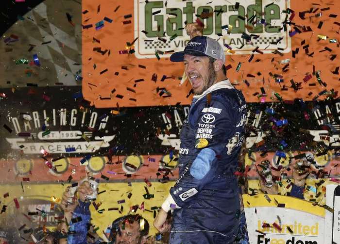 Martin Truex Jr. celebrates in Victory Lane after winning the Sprint Cup Series race on Sunday in Darlington S.C. Associated Press