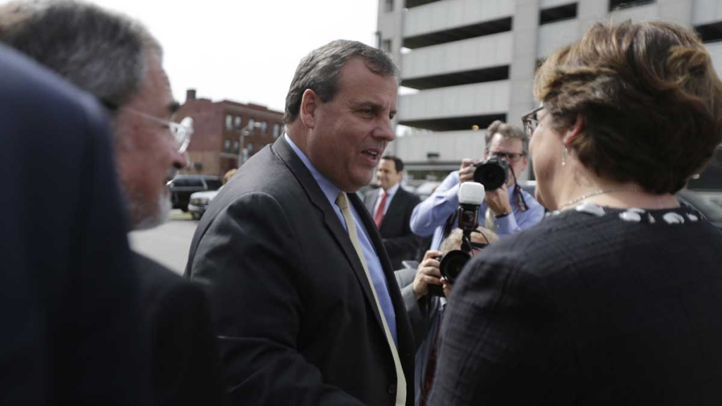 New Jersey Gov. Chris Christie is greeted as he arrives at University Hospital for the grand opening of the Rutgers Cancer Institute of New Jersey Tuesday. He did not answer questions about revelations at the Bridgegate trial