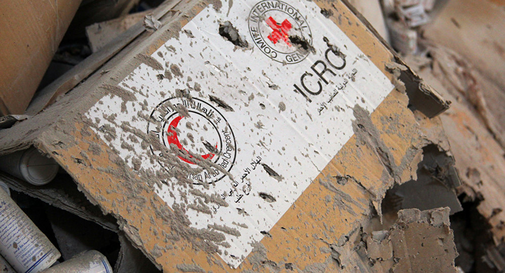 Damaged Red Cross and Red Crescent medical supplies lie inside a warehouse after an airstrike on the rebel held Urm al Kubra town western Aleppo city Syria