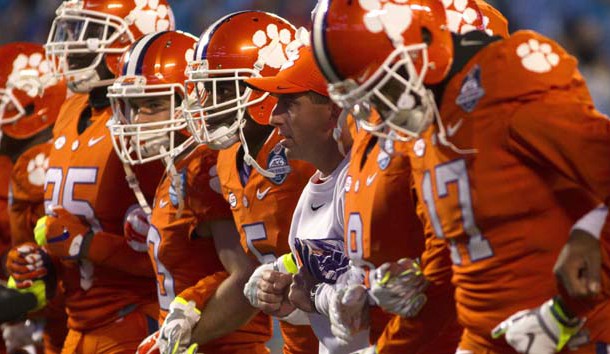 Dec 5 2015 Charlotte NC USA Clemson Tigers head coach Dabo Swinney and his team prior to their ACC football championship game against the North Carolina Tar Heels at Bank of America Stadium