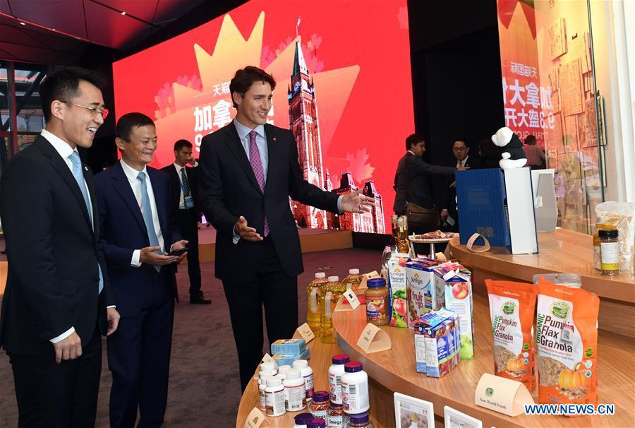 Canadian Prime Minister Justin Trudeau and Alibaba's chairman Jack Ma grab lobsters from Canada at the headquarter of Alibaba in Hangzhou capital of east China's Zhejiang Province Sept. 3 2016. On Saturday an official Tmall online shop for Canadian