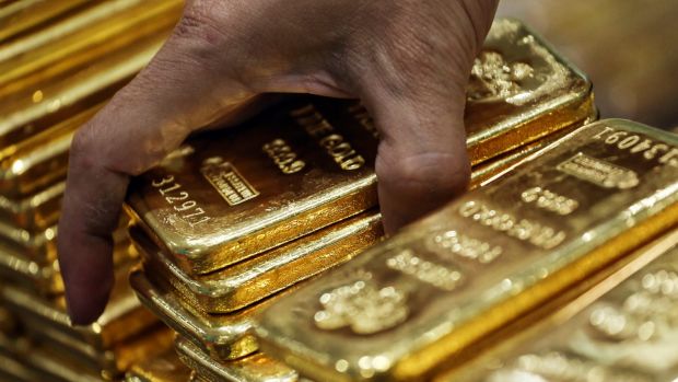 Gold futures for December delivery advanced 1 per cent to settle at $US1344.70 an ounce at 1.50pm on the Comex in New