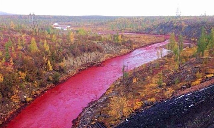 Authorities in Russia are trying to determine why the waters of the Daldykan River in Siberia have suddenly turned bright red