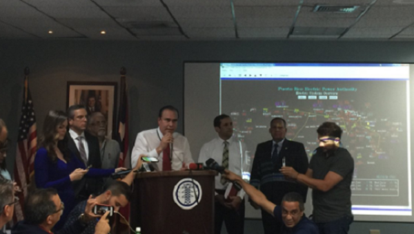 Authorities including Governor Alejandro García Padilla give an update on the situation in a press conference