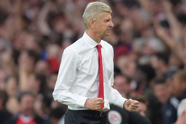 BPI

Happy Wenger gives it the double fist-pump as Arsenal go 3-0 up after just 40 minutes