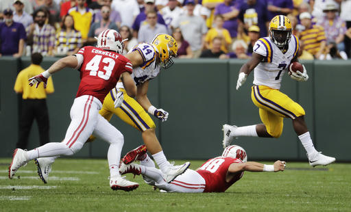 LSU's Leonard Fournette runs during the first half of an NCAA college football game against Wisconsin Saturday Sept. 3 2016 in Green Bay Wis