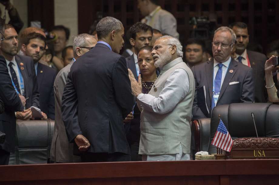 President Obama talks with Indian Prime Minister Modi Narendra at a summit meeting in Vientiane Laos