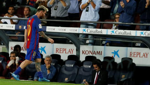 Barcelona's Lionel Messi leaves the pitch