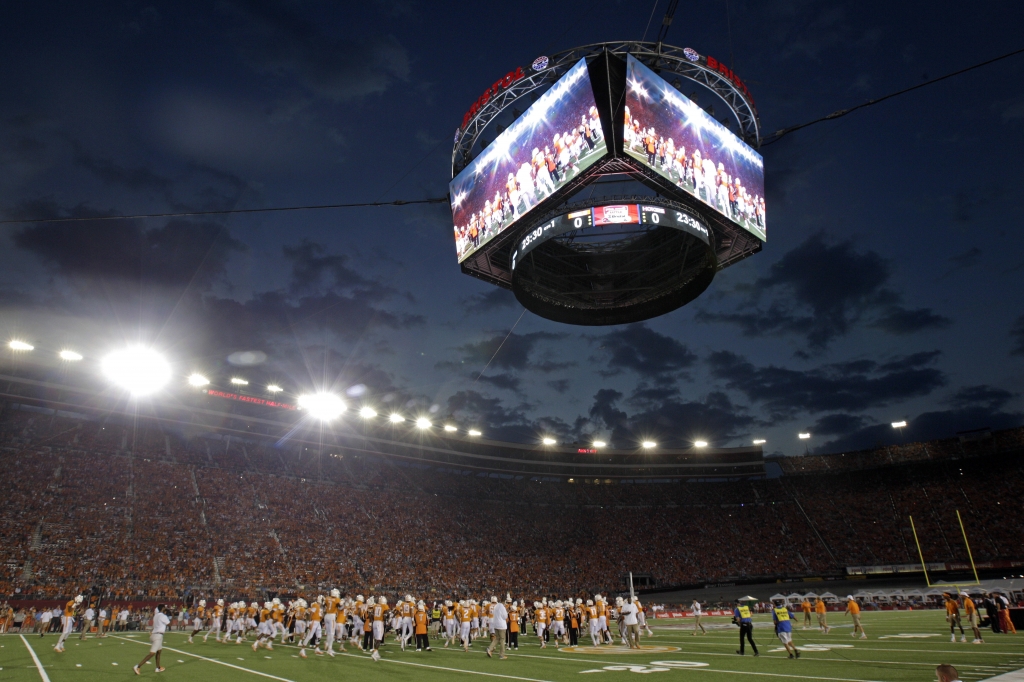 Tennessee players take the field before playing Virginia Tech at Bristol Motor Speedway in an NCAA college football game Saturday