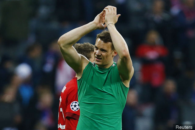 Bayern Munich's Manuel Neuer applauds the fans at the end of the game