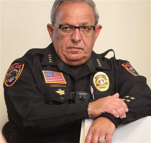 Bay St. Louis Chief of Police Michael De Nardo listens during a city council meeting in Bay St. Louis Miss. Hancock County Coroner Jim Faulk said Chief De Nardo died Thursday Sept. 8