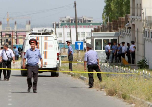 Investigators Interior Ministry officers and members of security forces work near the site of a bomb blast outside China's embassy in Bishkek Kyrgyzstan Aug 30 2016. Reuters