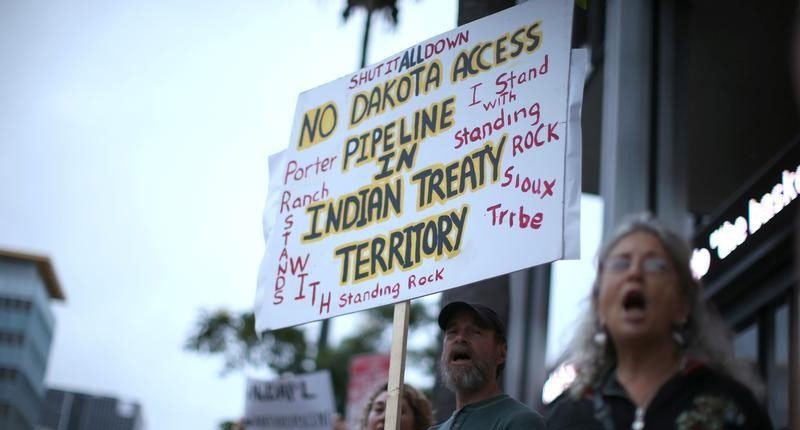 Protesters demonstrate against the Energy Transfer Partners&#039 Dakota Access oil pipeline near the Standing Rock Sioux reservation in Los Angeles California