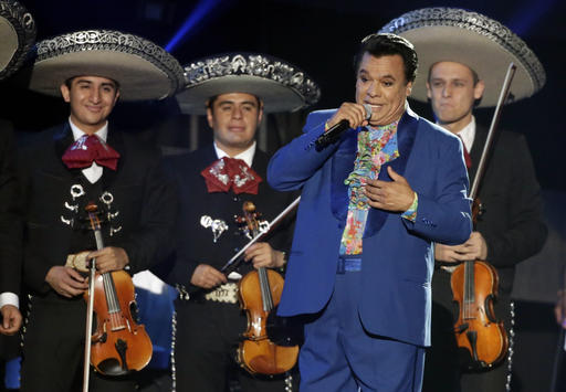 Mexican singer Juan Gabriel performs during the Latin Billboard Awards in Coral Gables Fla. Representatives of Juan Gabriel have reported Sunday Aug. 28 2016 that he has died. Gabriel was Mexico's leading sin