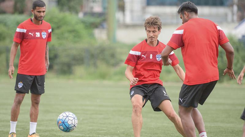 Bengaluru FC players during a training session at the Bangalore Football Stadium on Tuesday