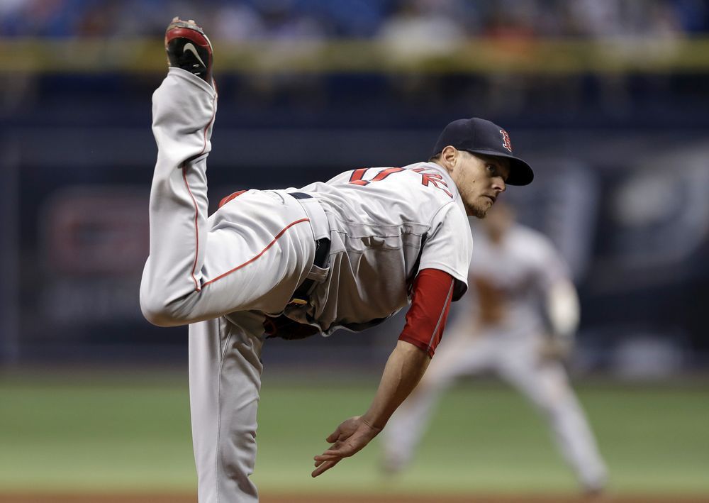 Boston Red Sox starting pitcher Clay Buchholz follows through on a pitch to the Tampa Bay Rays during the first inning of a baseball game Tuesday Aug. 23 2016 in St. Petersburg Fla