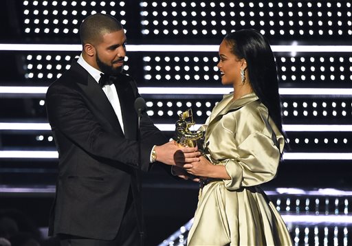 Drake left presents the Michael Jackson Video Vanguard Award to Rihanna at the MTV Video Music Awards at Madison Square Garden on Sunday Aug. 28 2016 in New York