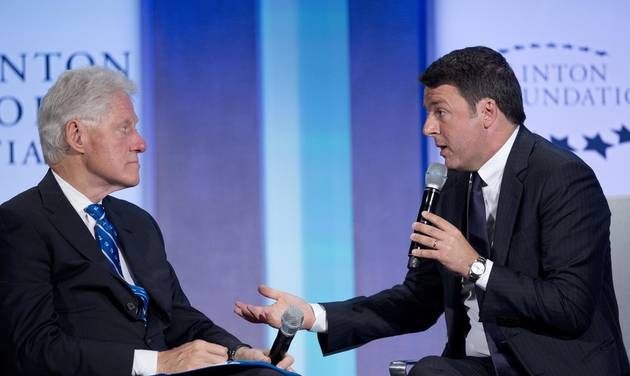 Former U.S. President Bill Clinton left and Italian Prime Minister Matteo Renzi participate in the session'Partnering for Global Prosperity' at the Clinton Global Initiative Monday Sept. 19 2016 in New York