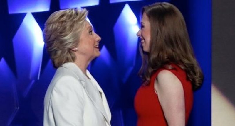 Democratic presidential nominee Hillary Clinton hugs her daughter Chelsea as she arrives to accept the nomination on the fourth and final night at the Democratic National Convention in Philadelphia Pennsylvania