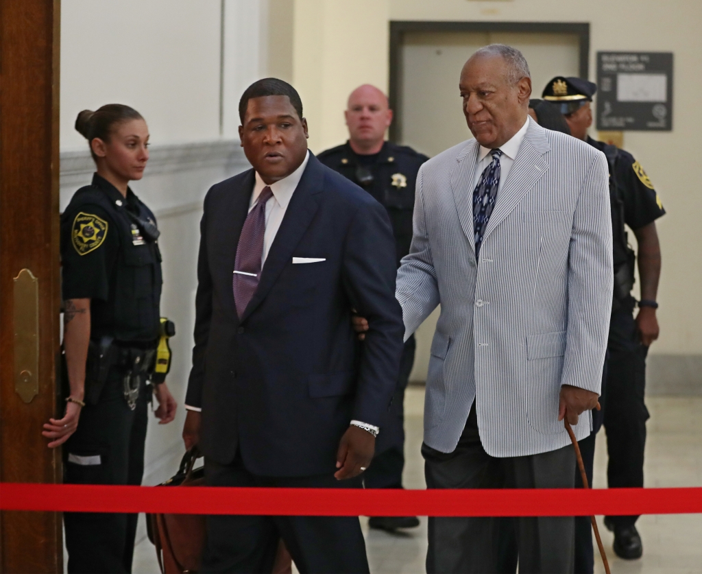 Bill Cosby is led into the Montgomery County Courthouse by one of his aides Sept. 6 2016 in Norristown Pa