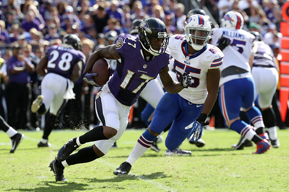 BALTIMORE MD- SEPTEMBER 11 Wide receiver Mike Wallce #89 of the Baltimore Ravens runs with the ball in the second half of the Buffalo Bills vs. the Baltimore Ravens game at M&T Bank Stadium