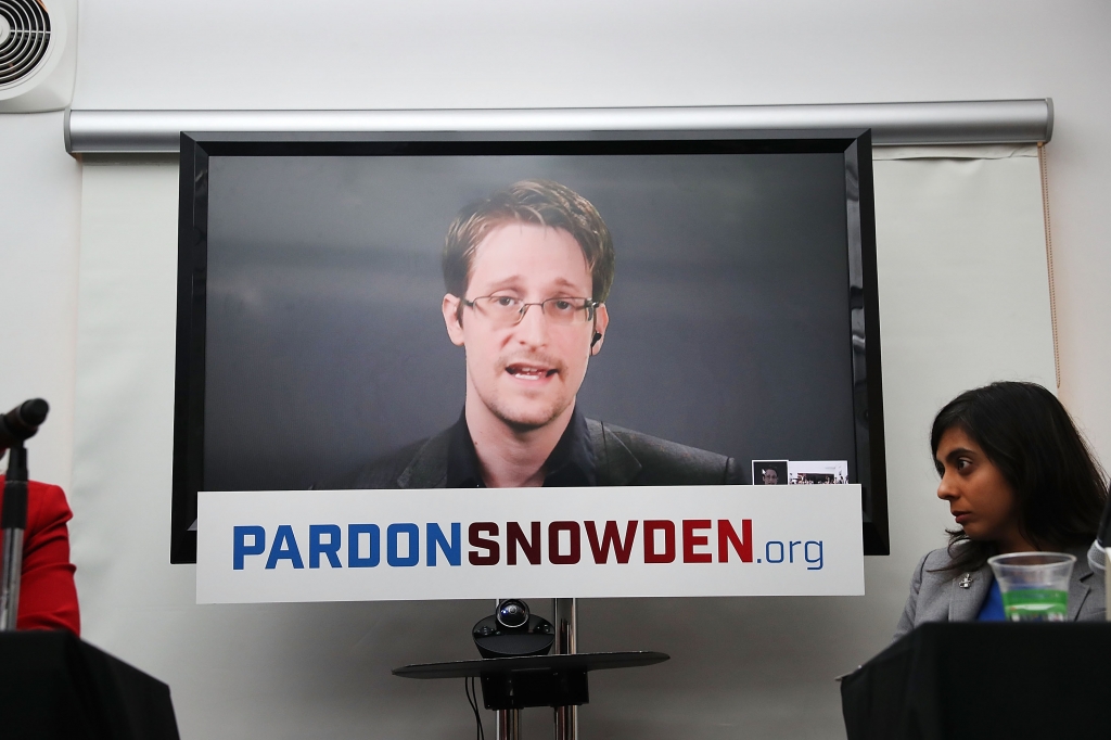 Edward Snowden speaks via video link at a news conference for the launch of a campaign calling for President Obama to pardon him in New York City on Sept. 14 2016