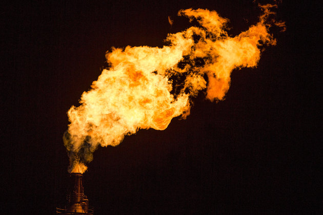 Bloomberg via Getty Images
Flames shoot from a tower at the Exxon Mobil Corp. Torrance Refinery in Torrance California