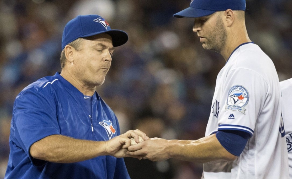 Blue Jays manager John Gibbons hooks starter J.A. Happ after the first five Angels hitters reached base in the sixth inning on Thursday night