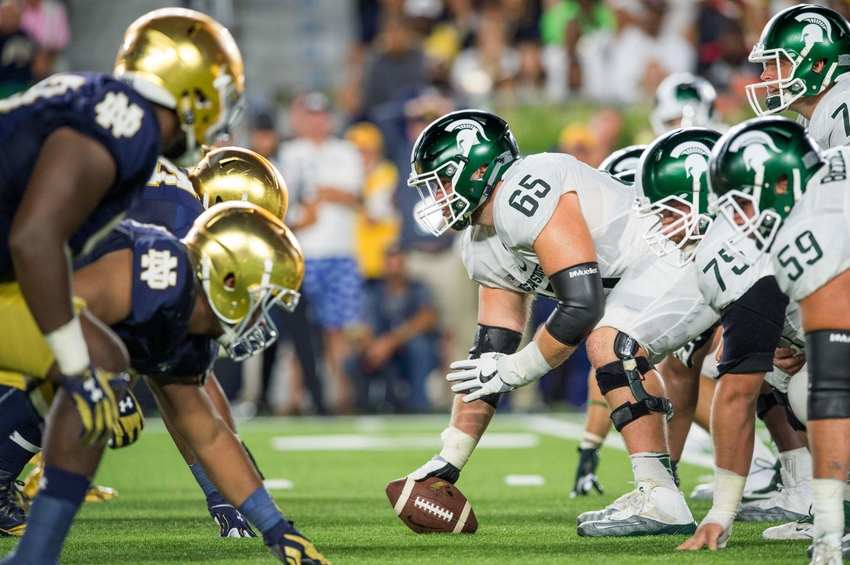 Sep 17 2016 South Bend IN USA Michigan State Spartans center Brian Allen prepares to snap the ball in the second quarter against the Notre Dame Fighting Irish at Notre Dame Stadium. Mandatory Credit Matt Cashore-USA TODAY Sports