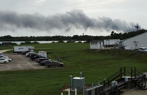 Smoke rises from a SpaceX launch site Thursday Sept. 1 2016 at Cape Canaveral Fla. NASA said SpaceX was conducting a test firing of its unmanned rocket when a blast occurred