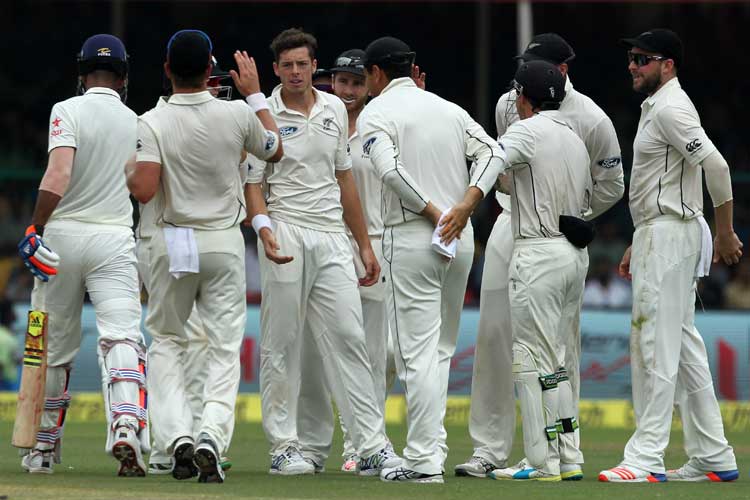 Bowling for the first time in a Test in India Mitchell Santner ended day one with figures of 3 for 77 from 20 overs in the first Test