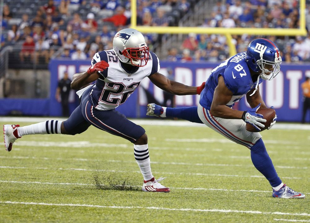 New England Patriots cornerback Justin Coleman chases New York Giants Sterling Shepard after Shepard made a catch in front of him during the first half of a preseason NFL football game Thursday Sept. 1 2016 in East Rutherford. (AP