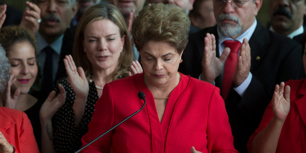 Brazil's ousted President Dilma Rousseff ends her address to supporters